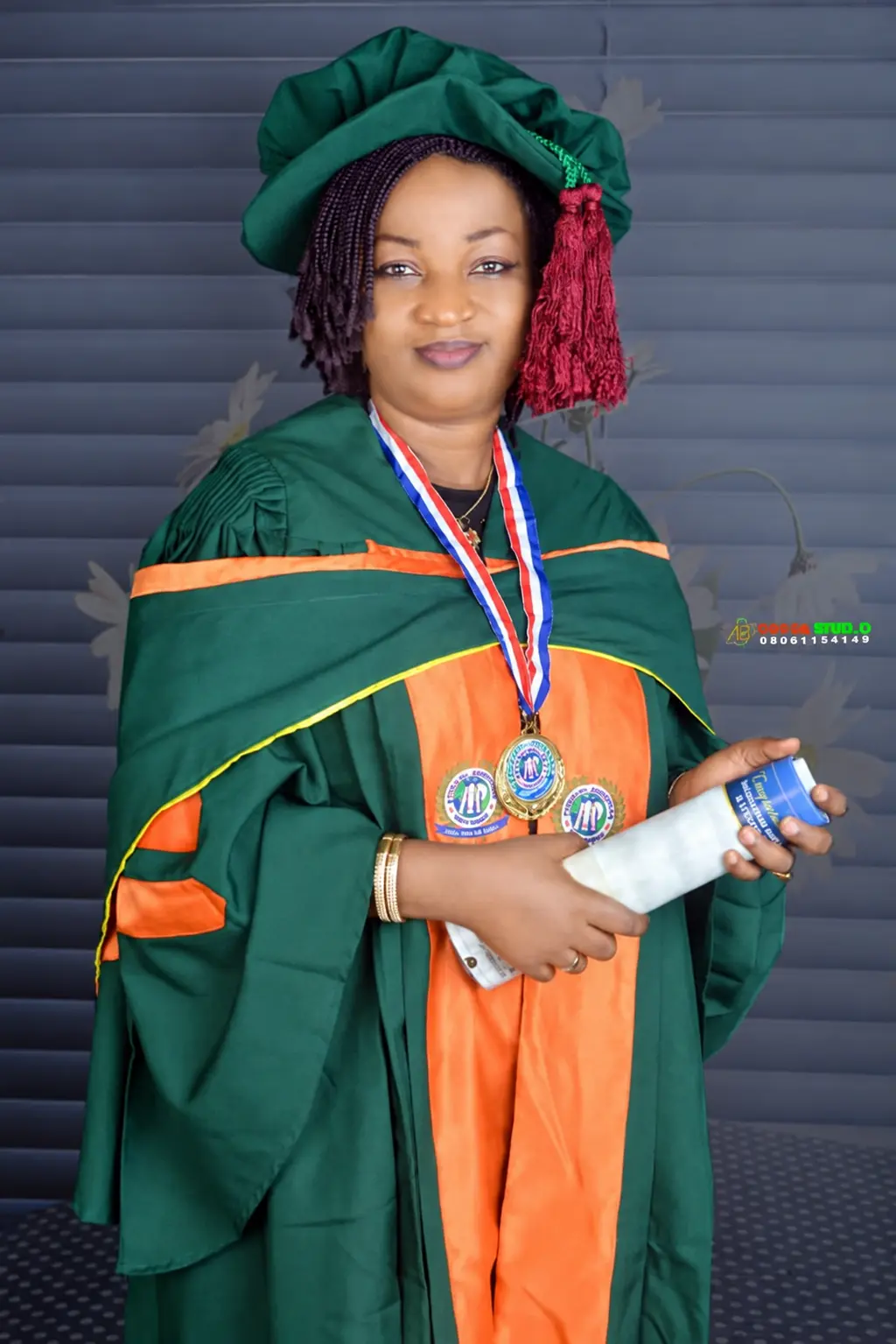 School-supplied professional portrait in academic regalia
