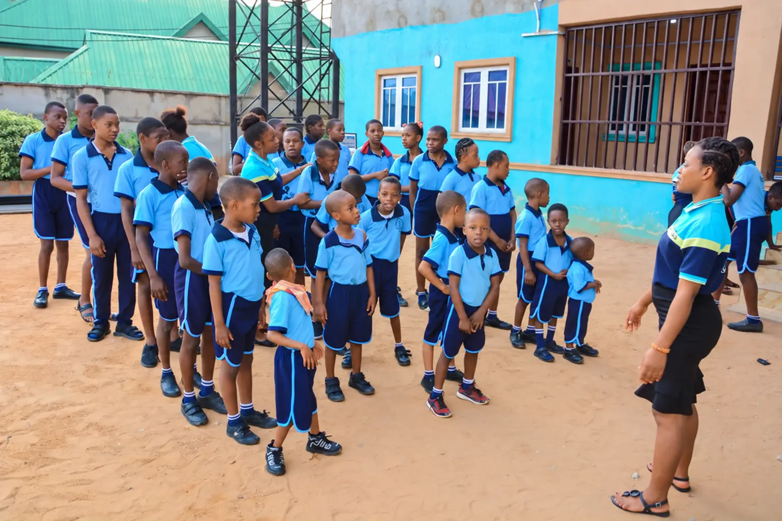 Pupils and staff gathered outdoors in the school courtyard